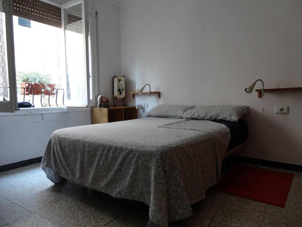 Postel nebo postele na pokoji v ubytování Casa taller Penelles