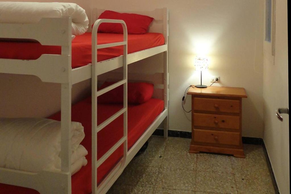 Postel nebo postele na pokoji v ubytování Casa taller Penelles