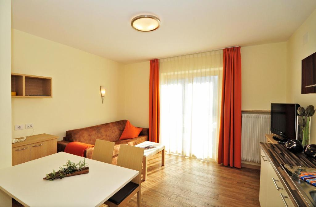 TV a/nebo společenská místnost v ubytování Residence Mignon