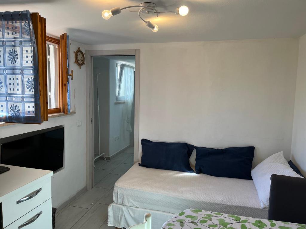 Postel nebo postele na pokoji v ubytování La Conchiglia sul Mare