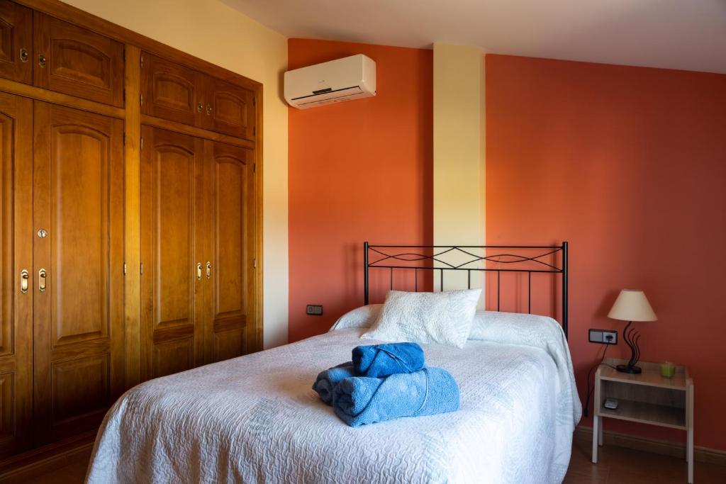 Postel nebo postele na pokoji v ubytování Balcón del Guadalquivir