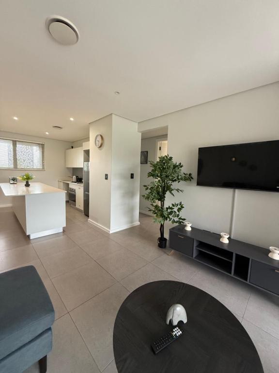 TV a/nebo společenská místnost v ubytování Pebble Haven Umhlanga