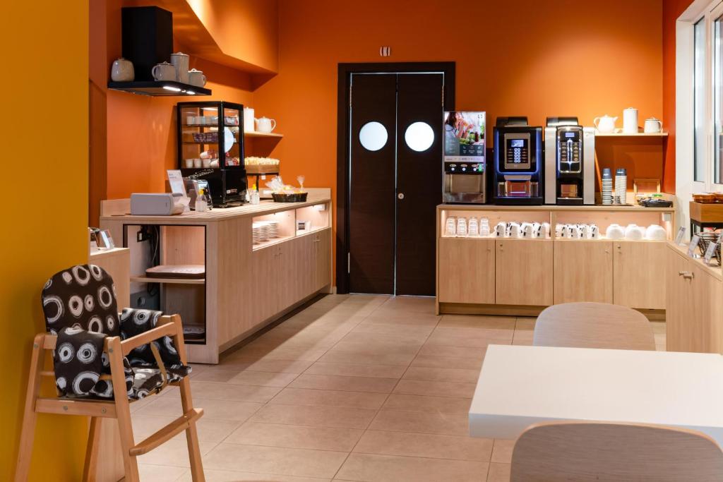 Kuchyň nebo kuchyňský kout v ubytování B&B Hotel Roma Pietralata Tiburtina