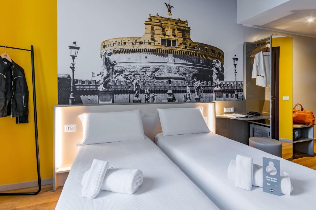 Postel nebo postele na pokoji v ubytování B&B Hotel Roma Pietralata Tiburtina