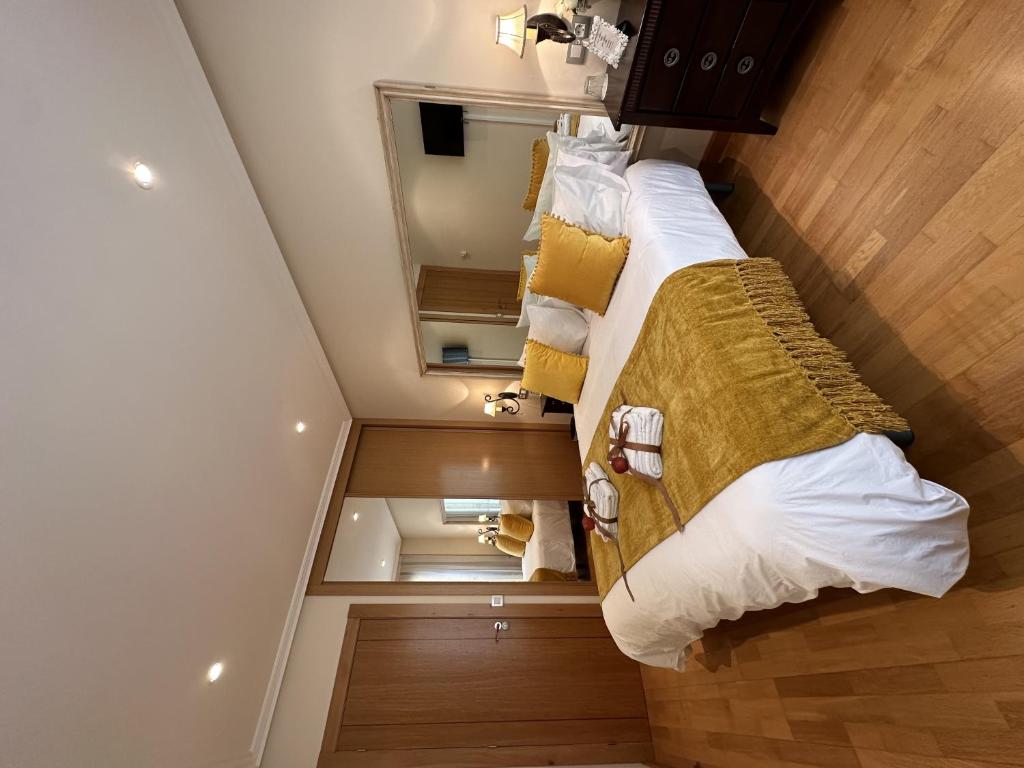 Postel nebo postele na pokoji v ubytování Clarens Guesthouse