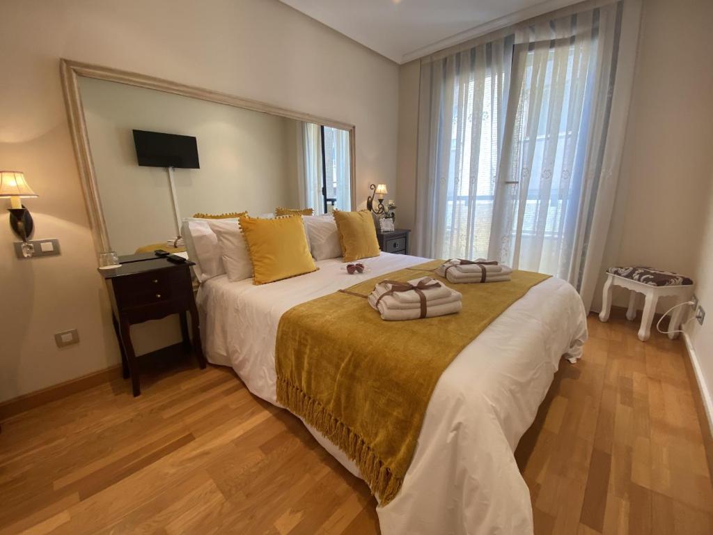 Postel nebo postele na pokoji v ubytování Clarens Guesthouse