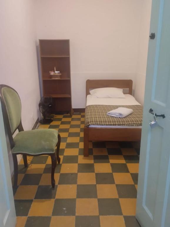 Postel nebo postele na pokoji v ubytování Sandalio Hostal Cali