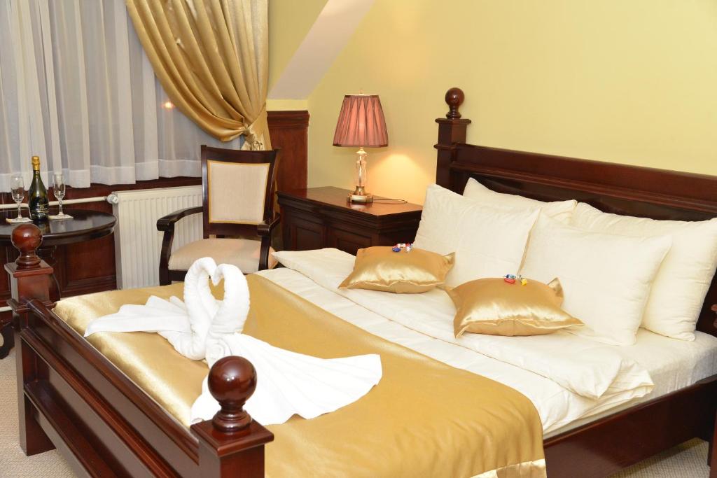 Postel nebo postele na pokoji v ubytování Hotel Zlatarski Zlatnik