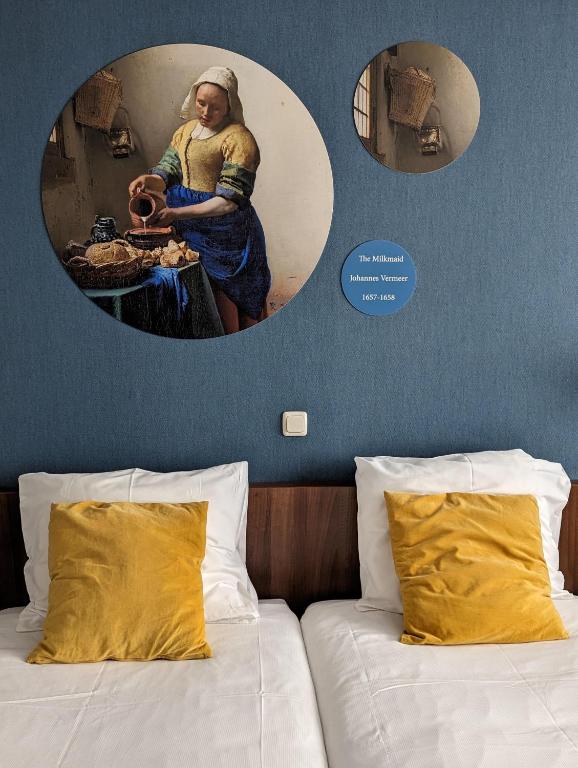 Postel nebo postele na pokoji v ubytování Hotel de Koophandel