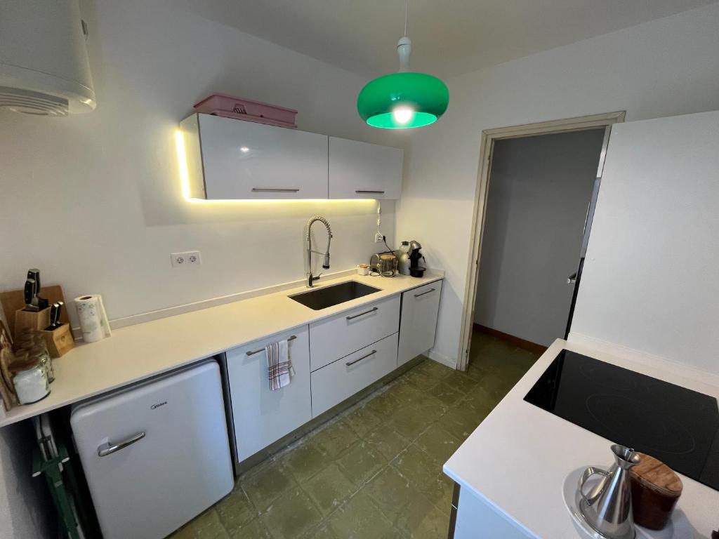 Kuchyň nebo kuchyňský kout v ubytování Apartamento en Casa Cardil