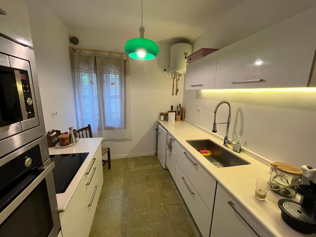Kuchyň nebo kuchyňský kout v ubytování Apartamento en Casa Cardil