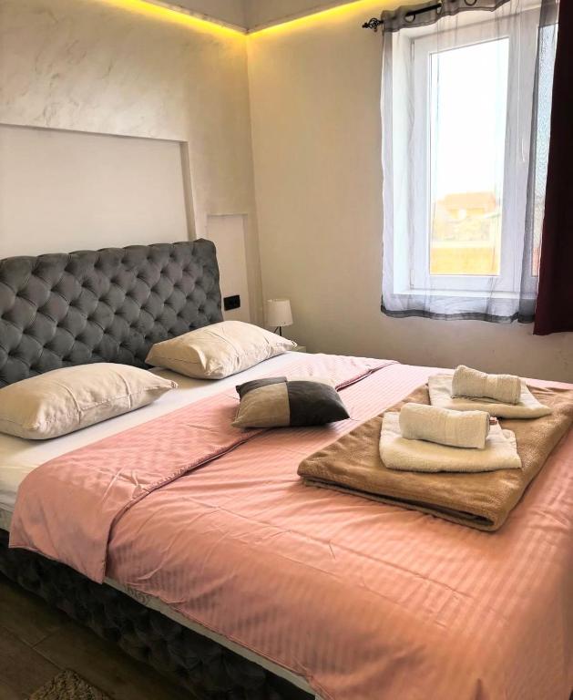 Postel nebo postele na pokoji v ubytování Gas Otel