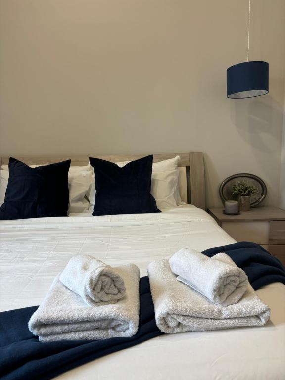 Posteľ alebo postele v izbe v ubytovaní Vesuvio House