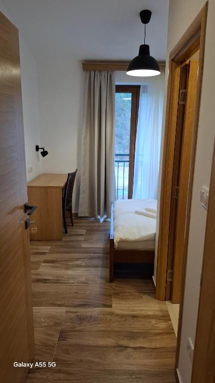 Voodi või voodid majutusasutuse Konak Studenica 1186 toas