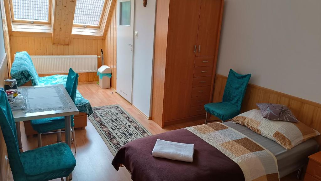 Postel nebo postele na pokoji v ubytování Agroturystyka STANICA