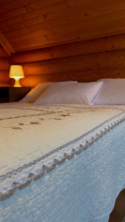 Postel nebo postele na pokoji v ubytování Cottage Kalinka