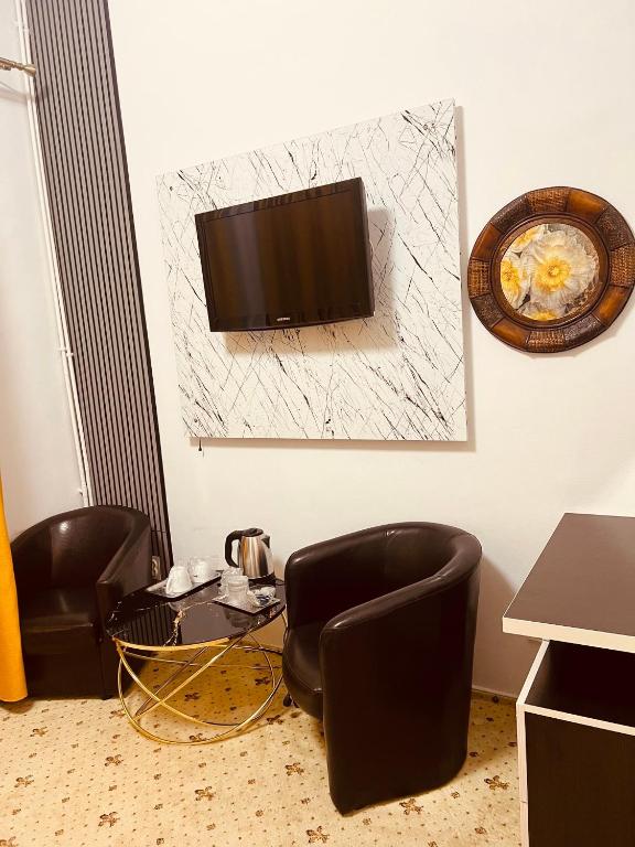 TV a/nebo společenská místnost v ubytování Hotel EvoZava Central