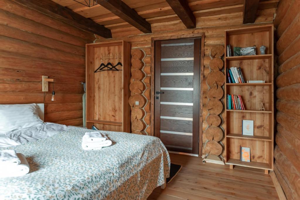 Postel nebo postele na pokoji v ubytování Chalet Borzhava