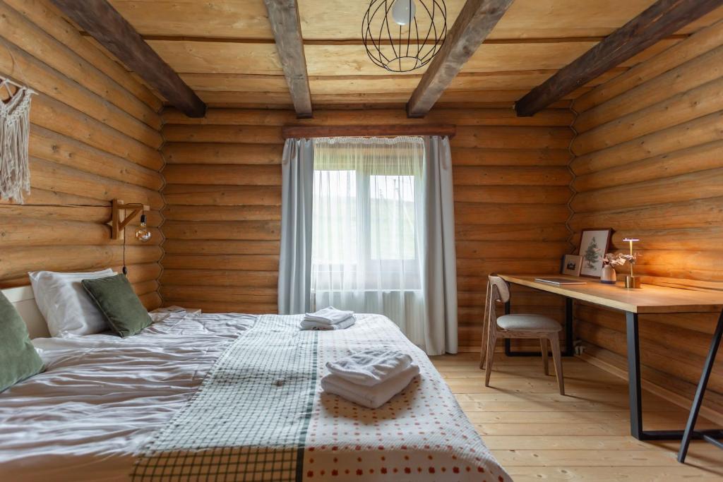 Postel nebo postele na pokoji v ubytování Chalet Borzhava