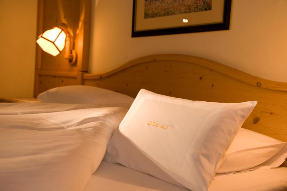 Postel nebo postele na pokoji v ubytování Hotel Koch