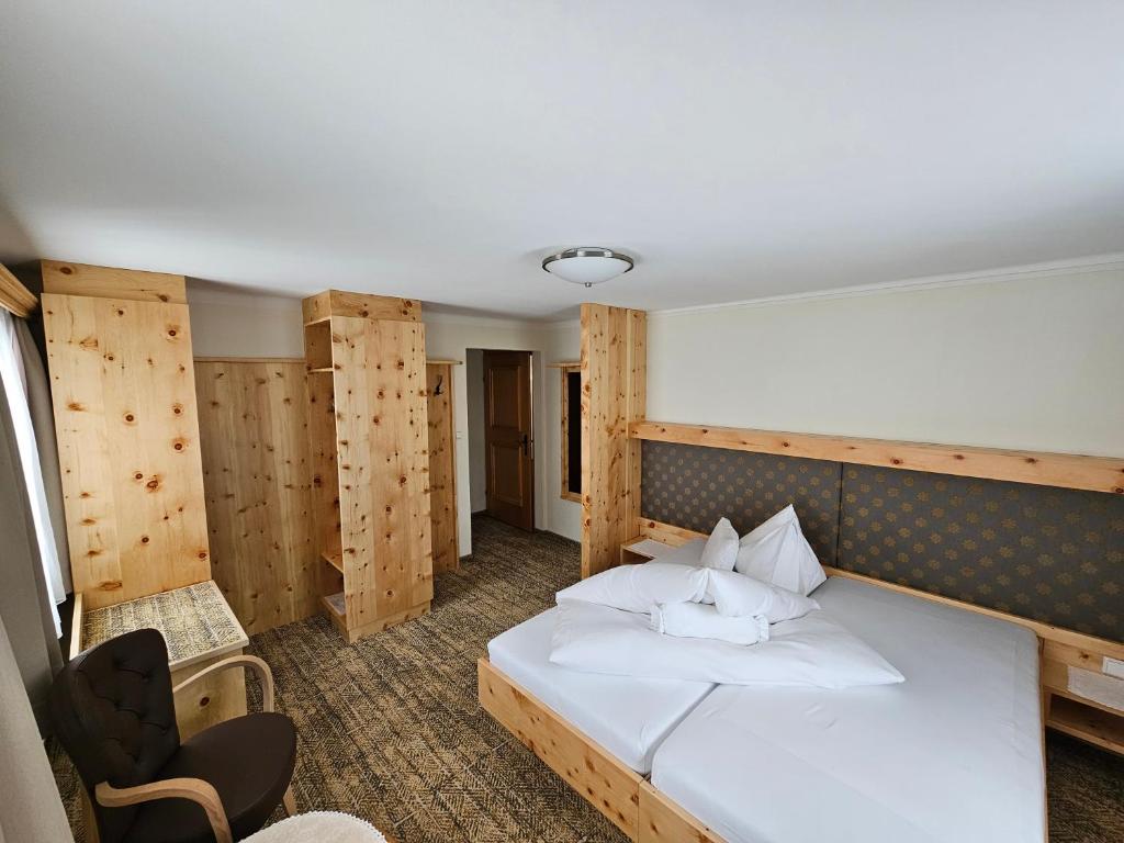 Postel nebo postele na pokoji v ubytování Hotel Koch
