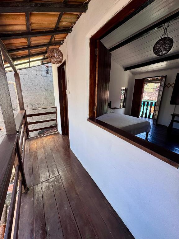 Postel nebo postele na pokoji v ubytování Casa Boa Suites