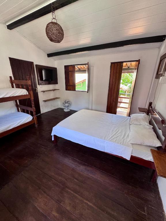 Postel nebo postele na pokoji v ubytování Casa Boa Suites
