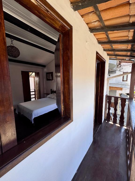 Postel nebo postele na pokoji v ubytování Casa Boa Suites