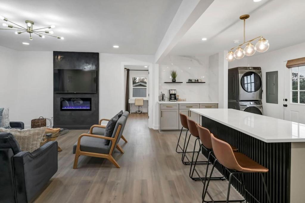 a kitchen and living room with a table and chairs at Earlewood Ranch - 4BR, 3BA in Columbia