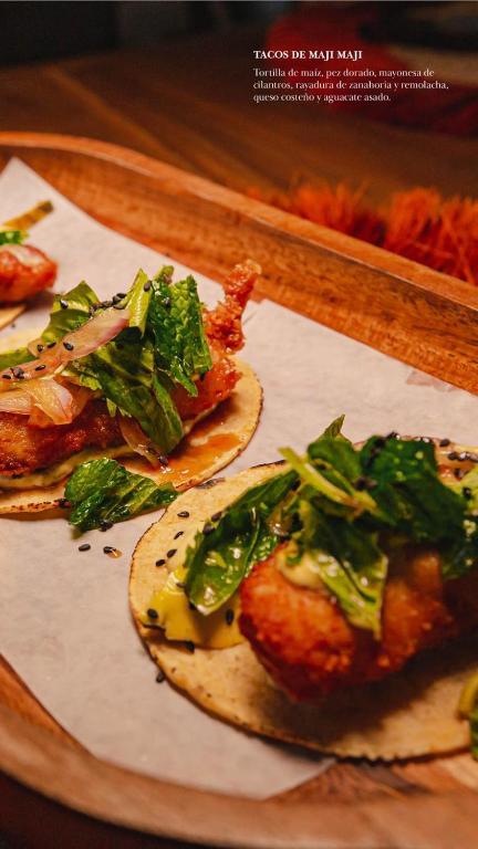 a plate of food with food on a table at Casa Coraje in Palomino