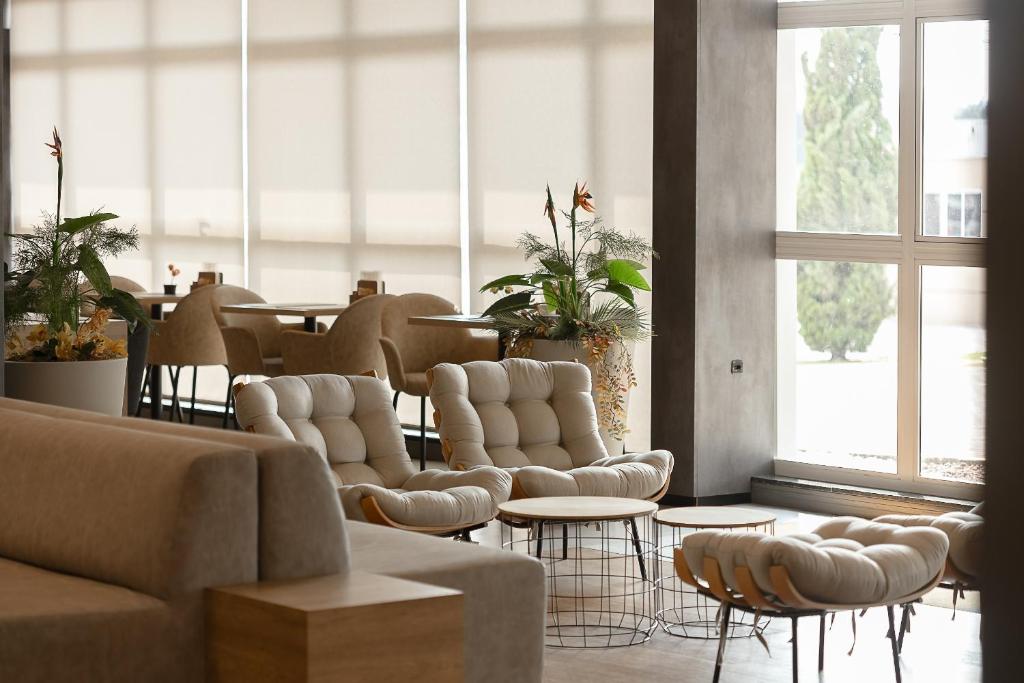 Posezení v ubytování Hotel 10 Ponta Grossa