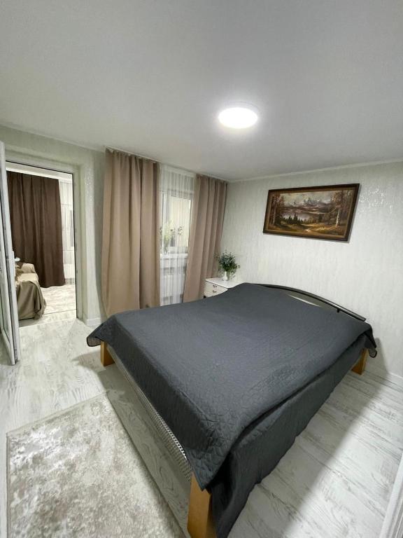 Llit o llits en una habitació de Дом 2 Комарова