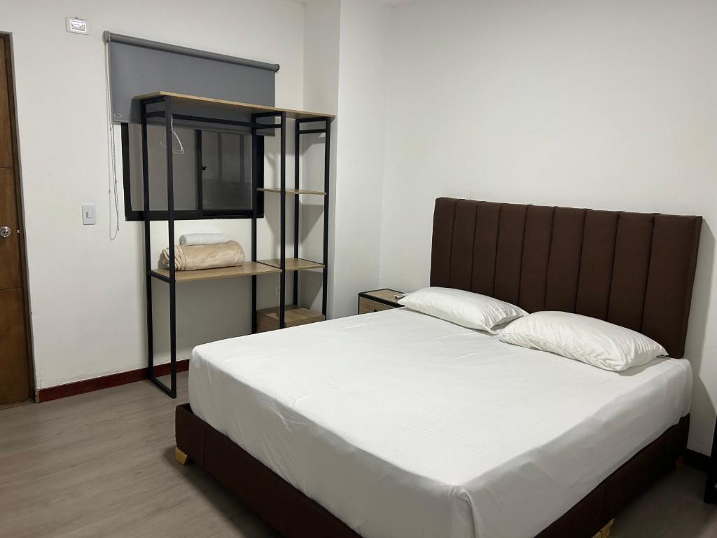 Postel nebo postele na pokoji v ubytování Hotel Gallery By 70