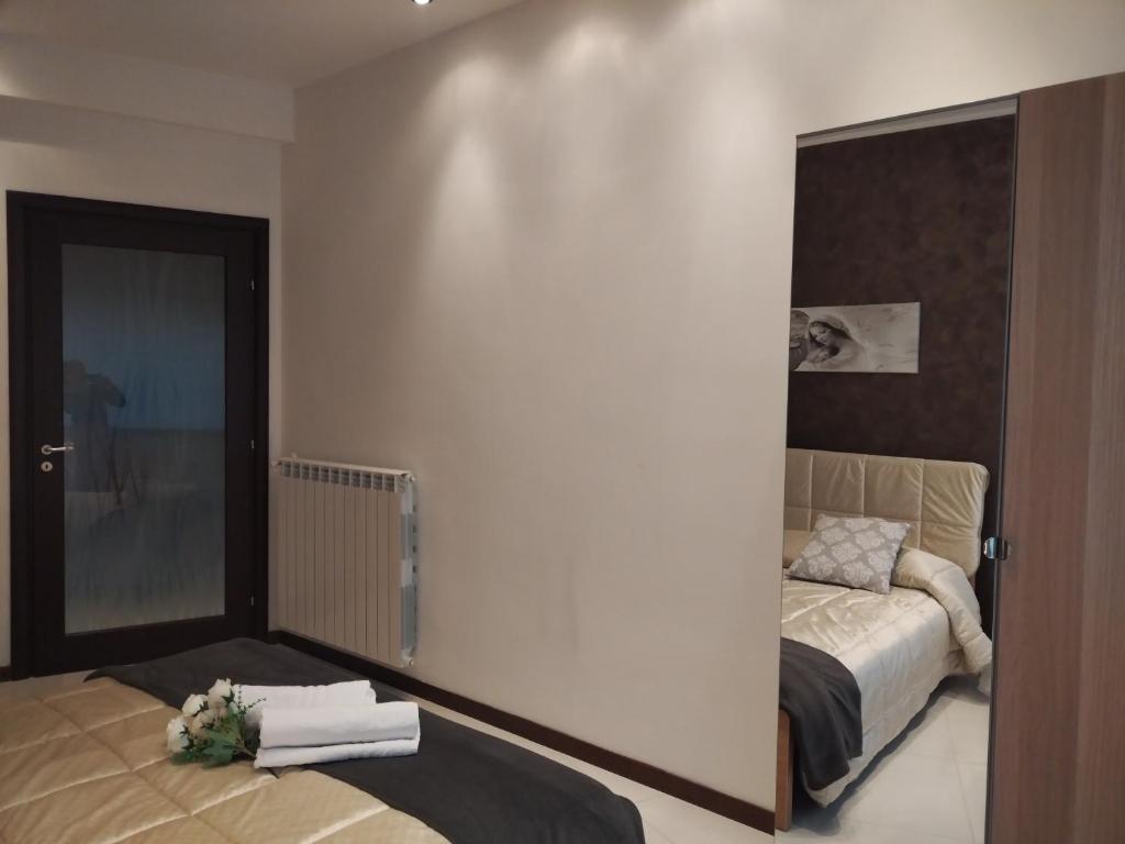 Postel nebo postele na pokoji v ubytování TWIN HOUSE