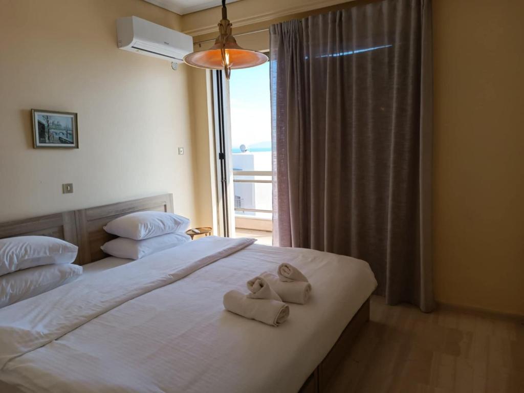 Posteľ alebo postele v izbe v ubytovaní Amazing Sea View, Rafina Port, Athens Airport, Self-Check-in
