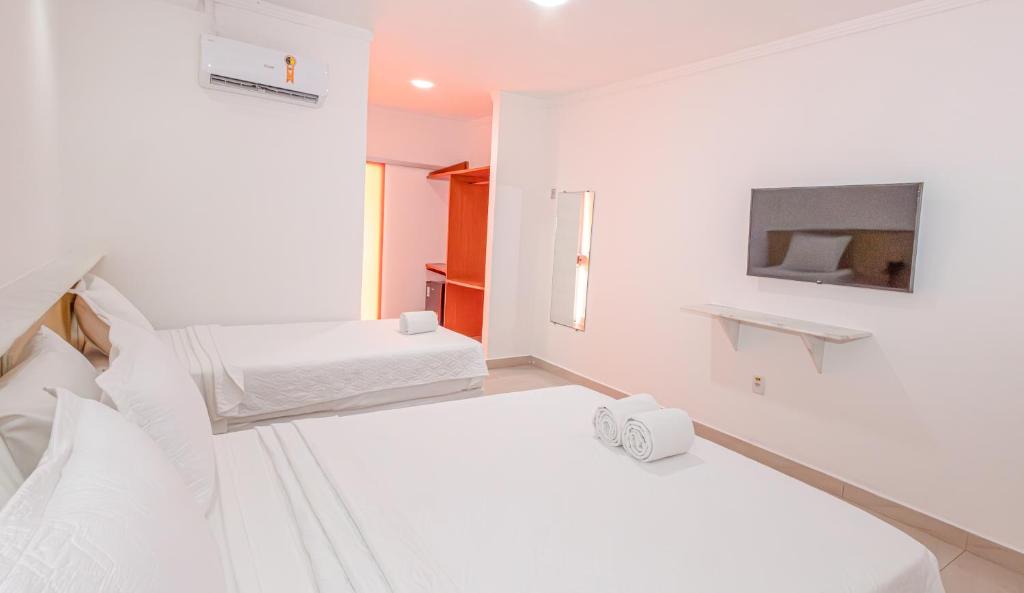 Postel nebo postele na pokoji v ubytování Ramada by Wyndham Porto Seguro Praia