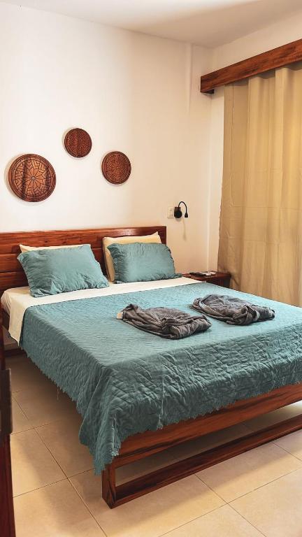 Postel nebo postele na pokoji v ubytování Pousada Casa de Hóspedes
