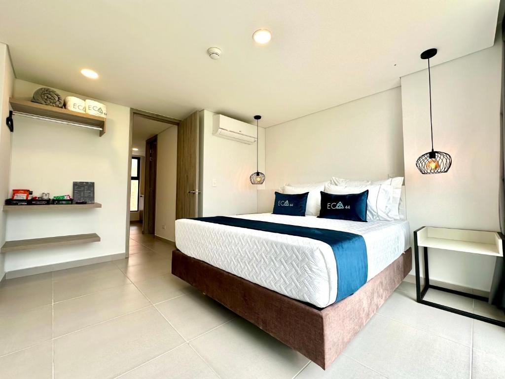 Postel nebo postele na pokoji v ubytování Hotel ECO 44