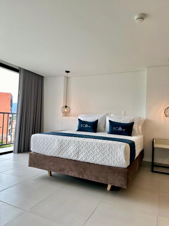 Postel nebo postele na pokoji v ubytování Hotel ECO 44