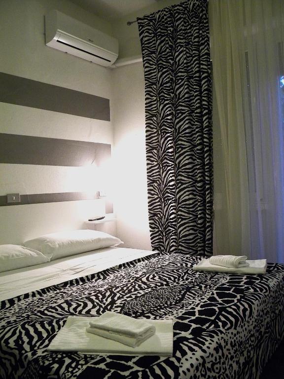 Postel nebo postele na pokoji v ubytování WuHostel