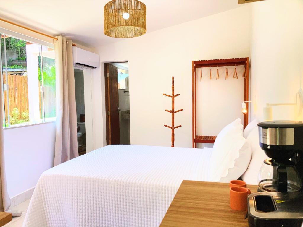 Postel nebo postele na pokoji v ubytování Meu Quintal Suítes - Búzios