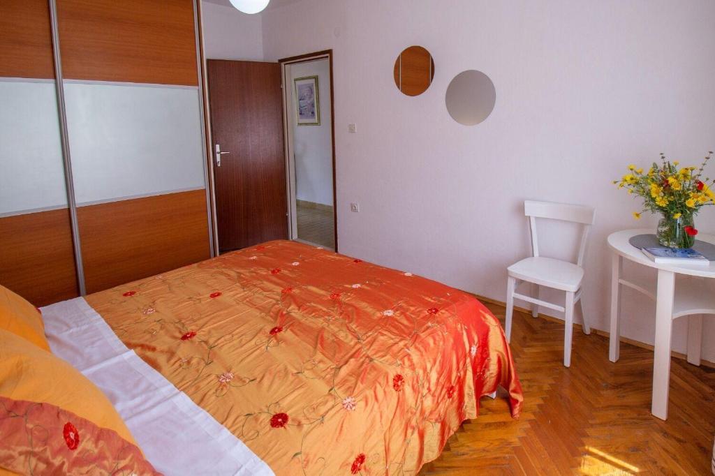 Postel nebo postele na pokoji v ubytování Apartment Zvone