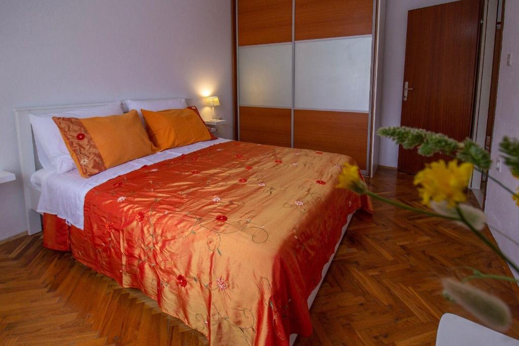 Postel nebo postele na pokoji v ubytování Apartment Zvone