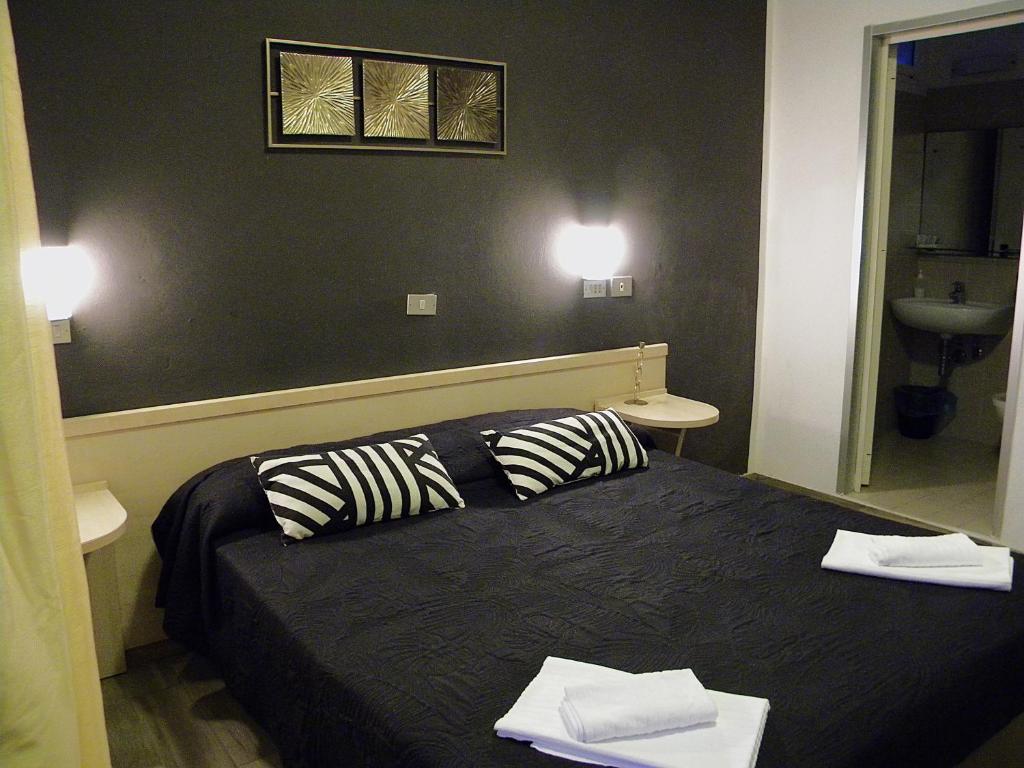 Postel nebo postele na pokoji v ubytování WuHostel