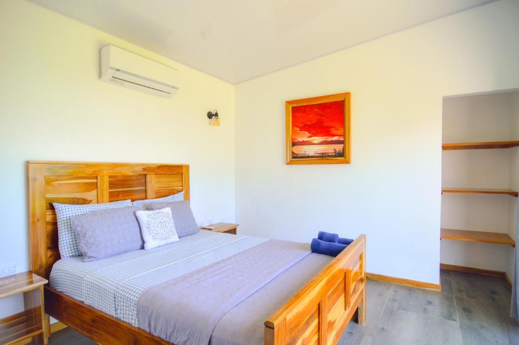 Postel nebo postele na pokoji v ubytování Canavida Villas & Resort