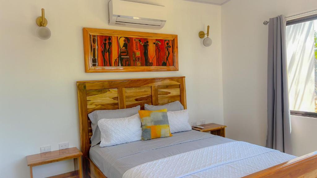 Postel nebo postele na pokoji v ubytování Canavida Villas & Resort