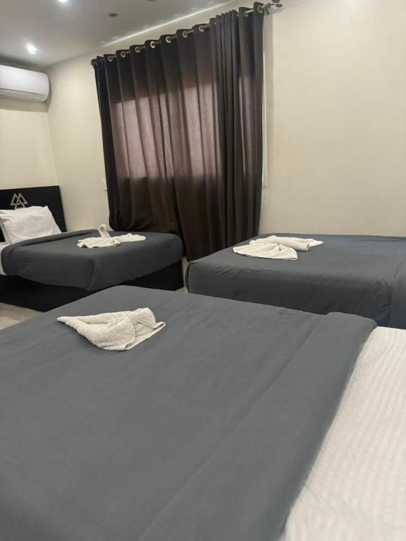 Postel nebo postele na pokoji v ubytování City pyramids inn