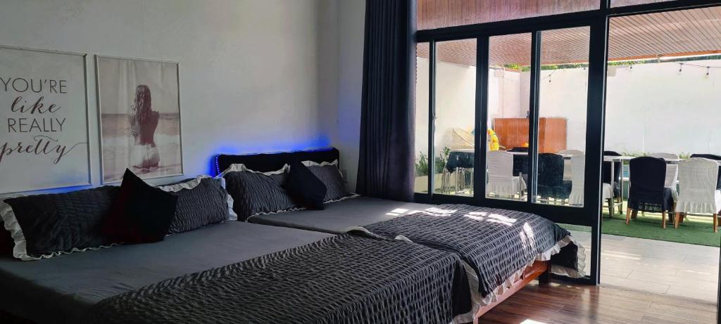 Postel nebo postele na pokoji v ubytování Triple-T Homestay VTS