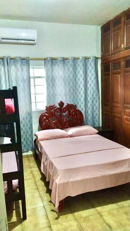 Cama ou camas em um quarto em Pousada 4 cantos