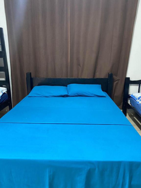 Cama ou camas em um quarto em Pousada 4 cantos